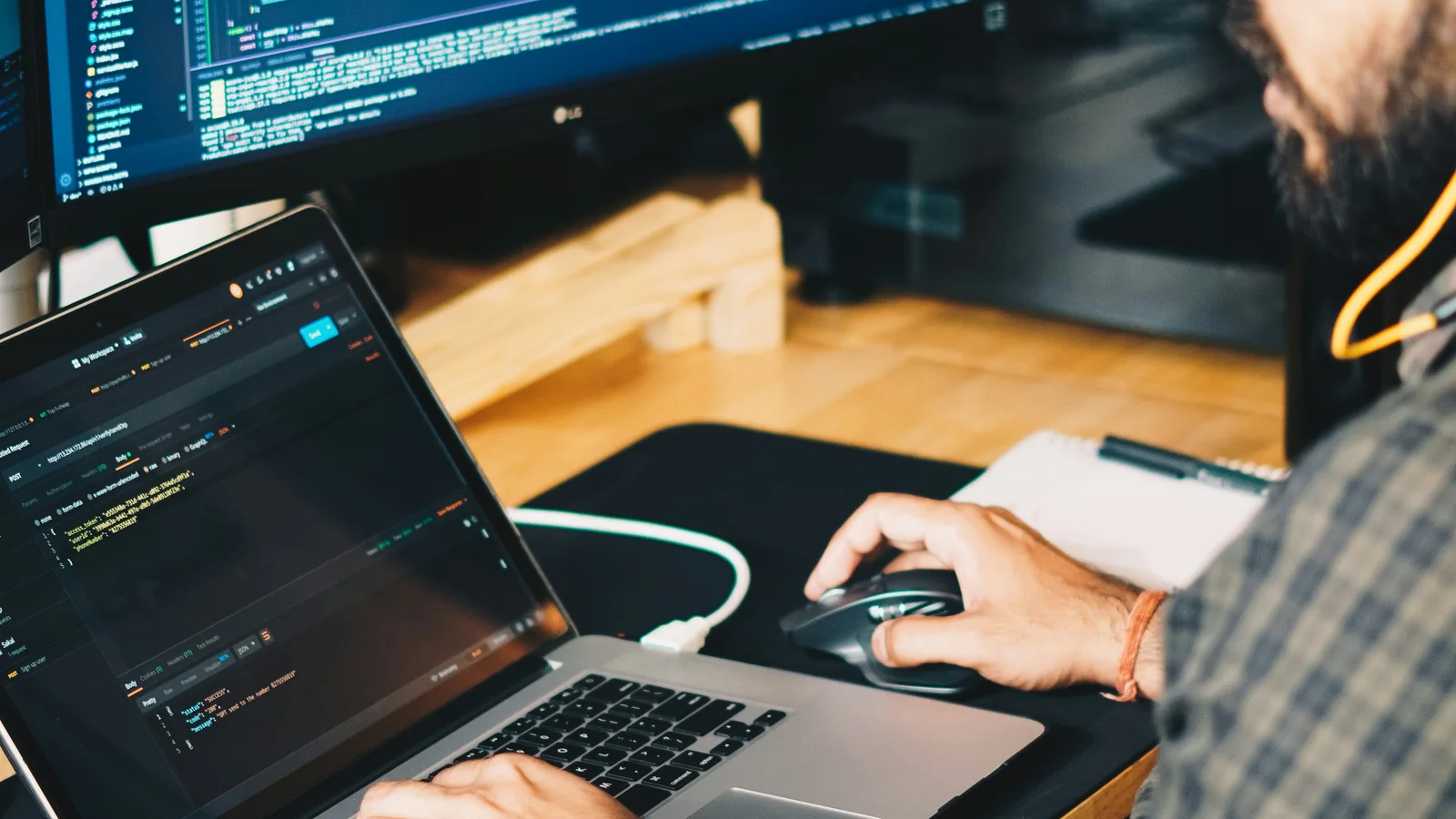 Application code, API checks, and operating notes open across several screens