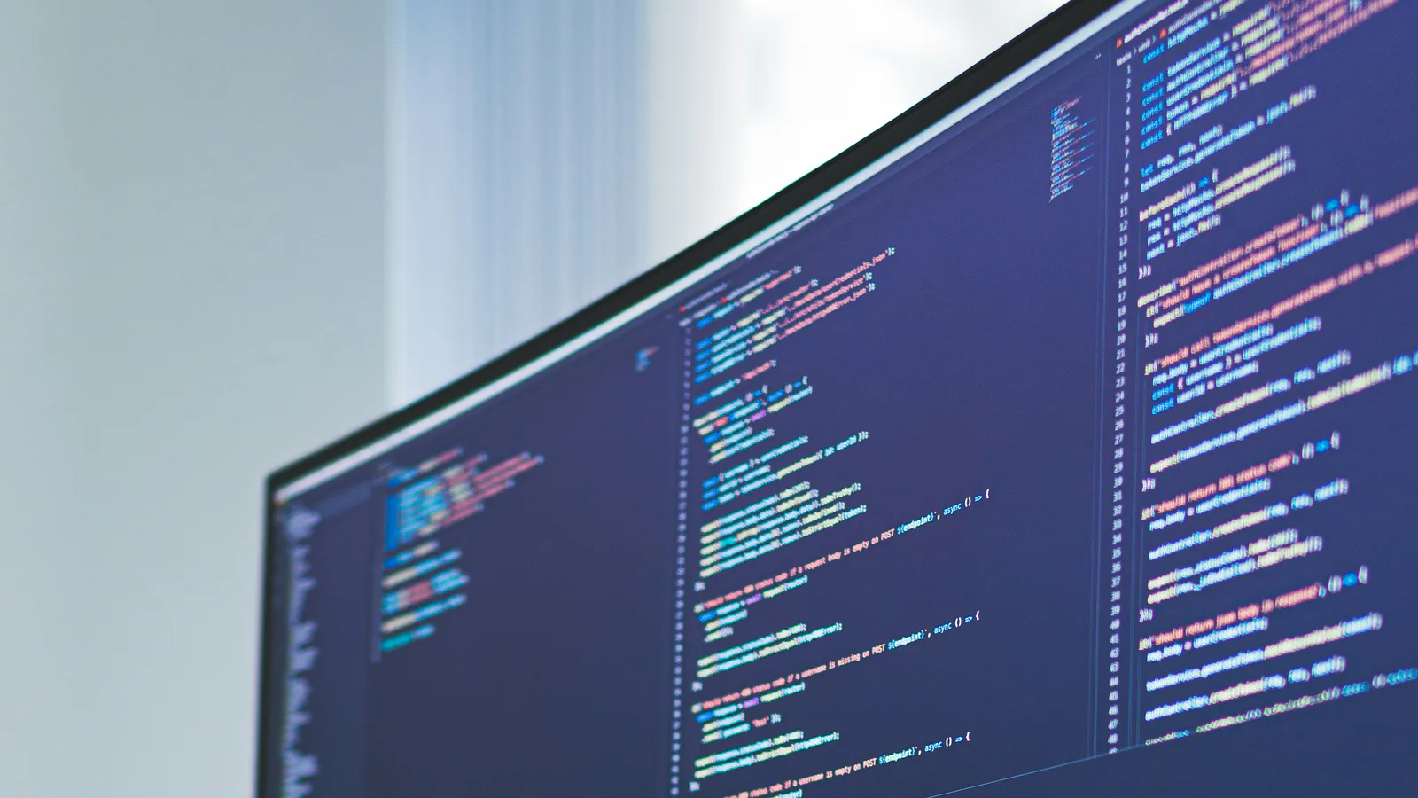 Application code displayed across a large development monitor